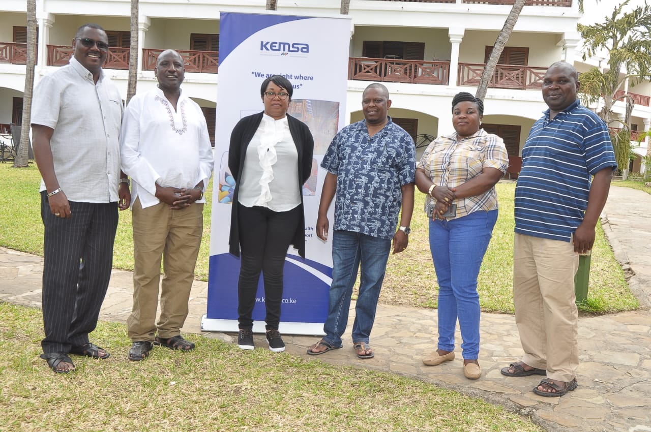 KEMSA Board of Directors Tom Wambua (left), Simon Ole Kirgotty, Dr Nelly Kimani, Chief Executive Officer Dr Jonah Manjari ,Peninah Mukabane and KEMSA Legal Director Fred Wanyonyi pose a photo during the KEMSA Board Induction