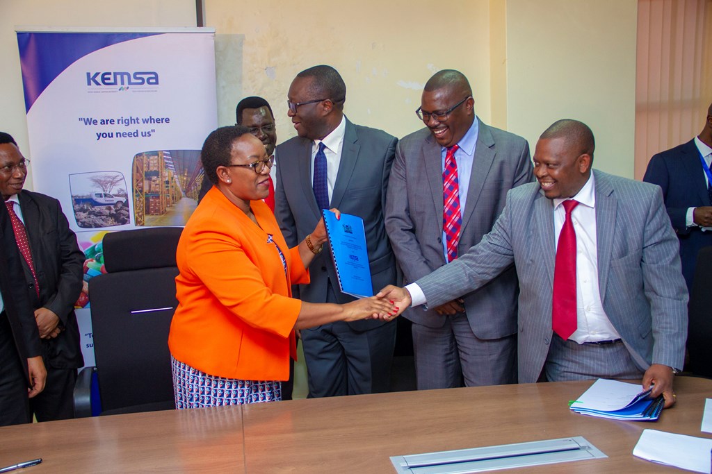 CS Sicily Kariuki shaking hands with Dr. Manjari.